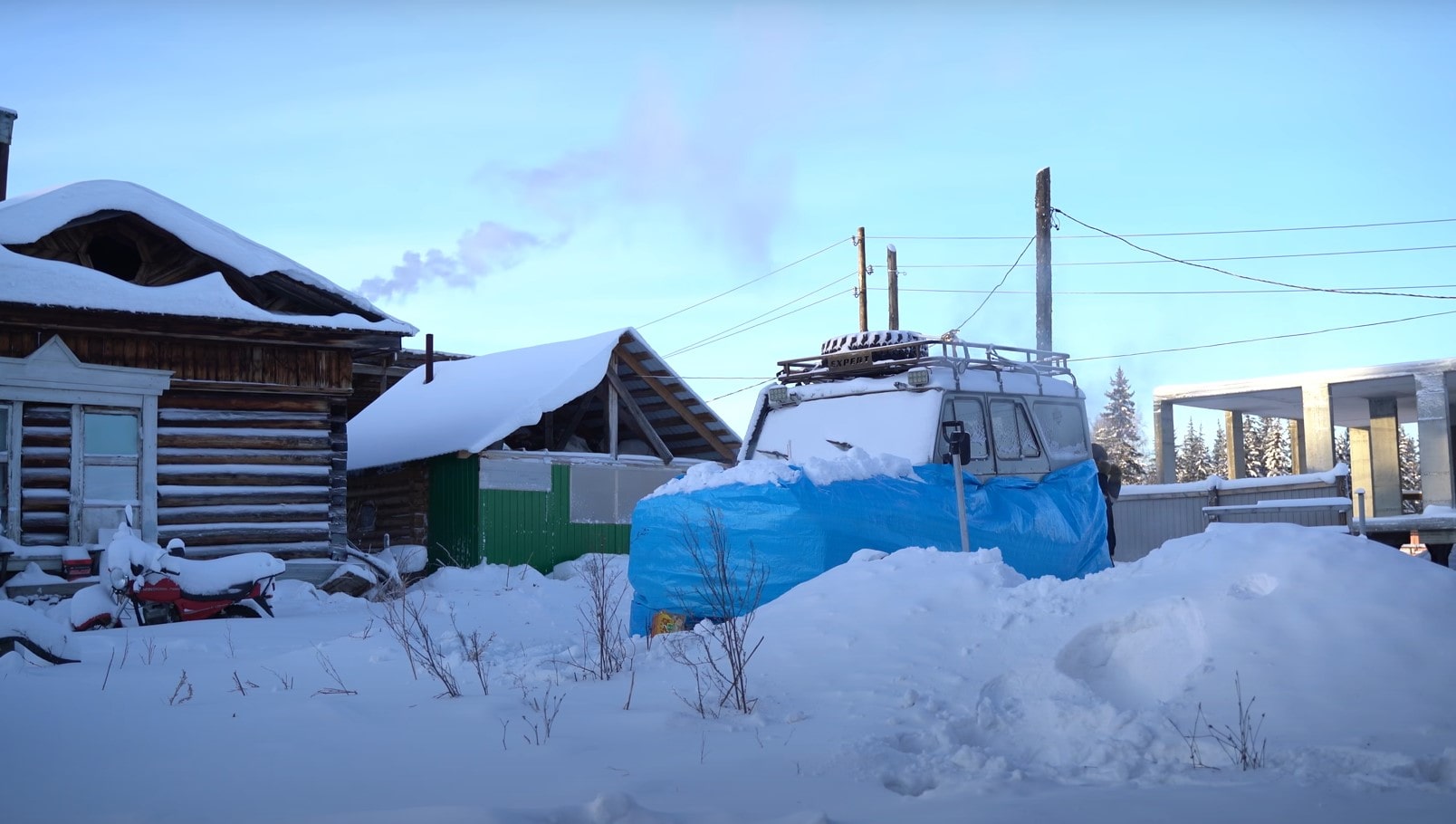 Как заводят автомобили в минус 50 в Якутии